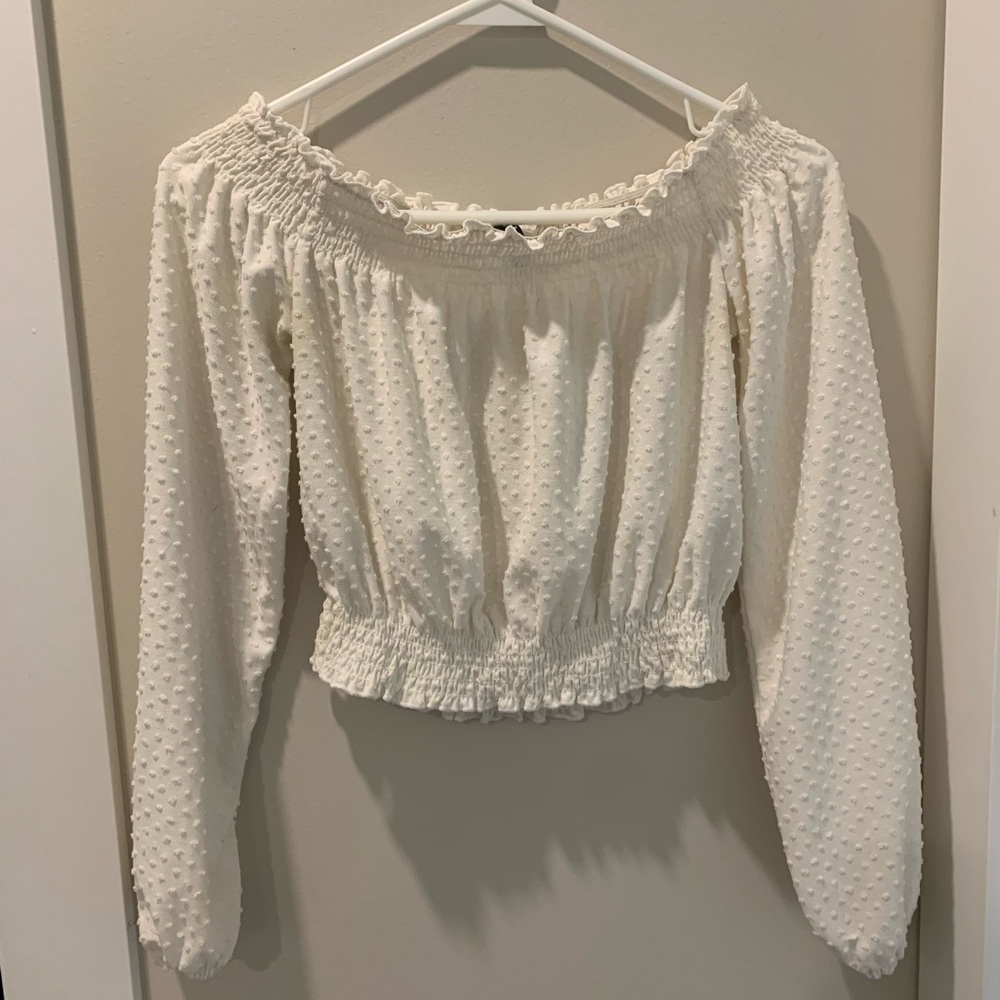 white cropped long sleeve top